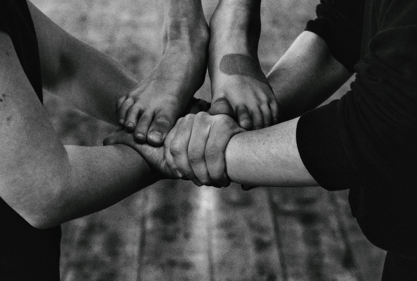 Photo by Alexander Krivitskiy grayscale photo of babys feet